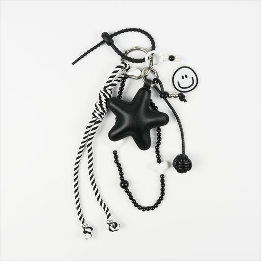 BLACK STAR SMILEY CHARM
